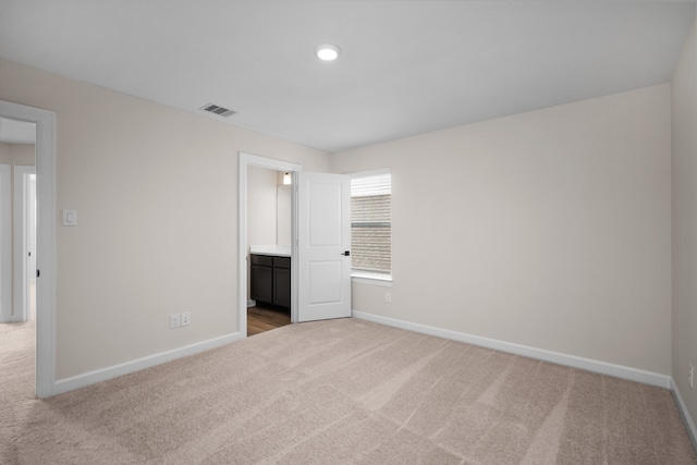 3126 Banyan Dr, Texas City, TX 77510 - unfurnished bedroom with carpet and connected bathroom