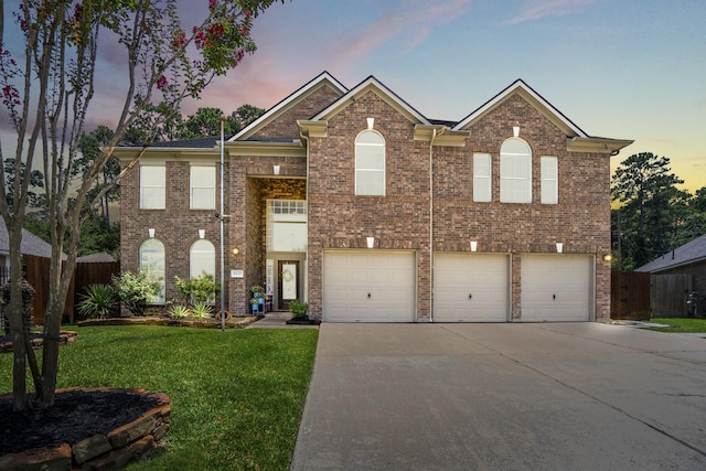 9227 Forest Creek Dr, Tomball, TX 77375 - view of front of home featuring driveway, an attached garage, and brick siding