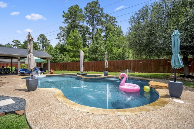 9227 Forest Creek Dr, Tomball, TX 77375 - view of swimming pool with a gazebo, a fenced backyard, a patio area, and a pool with connected hot tub