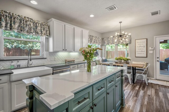 9227 Forest Creek Dr, Tomball, TX 77375 - kitchen featuring white cabinetry, green cabinets, backsplash, dark wood finished floors, and recessed lighting