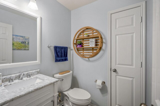 9227 Forest Creek Dr, Tomball, TX 77375 - bathroom with vanity and toilet