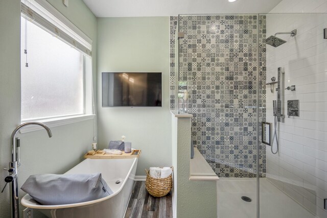 9227 Forest Creek Dr, Tomball, TX 77375 - bathroom with wood finished floors and a shower stall