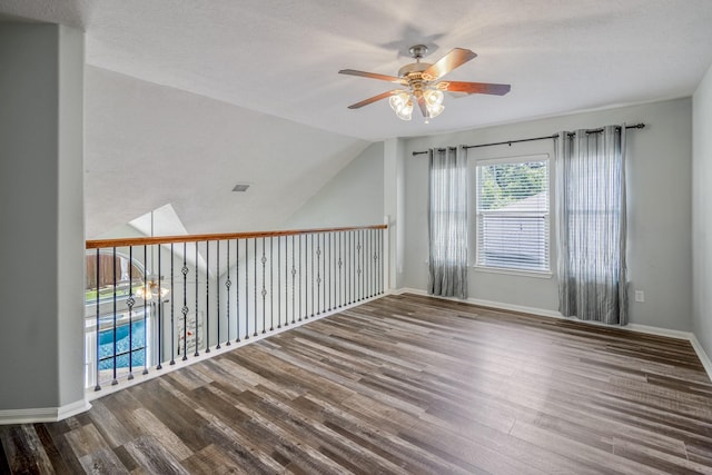9227 Forest Creek Dr, Tomball, TX 77375 - empty room with ceiling fan and wood finished floors