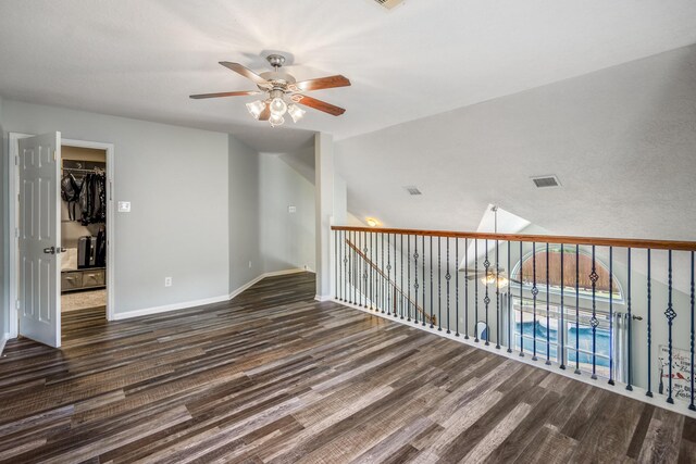 9227 Forest Creek Dr, Tomball, TX 77375 - empty room featuring a ceiling fan and wood finished floors