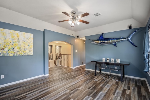 9227 Forest Creek Dr, Tomball, TX 77375 - spare room featuring ceiling fan, arched walkways, and wood finished floors