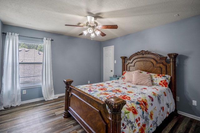 9227 Forest Creek Dr, Tomball, TX 77375 - bedroom featuring dark wood-style floors and a ceiling fan