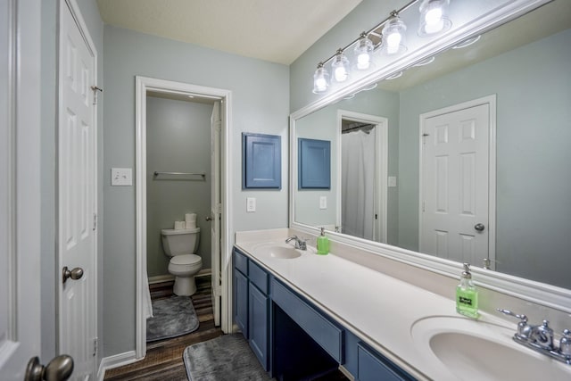 9227 Forest Creek Dr, Tomball, TX 77375 - full bath featuring double vanity and wood finished floors
