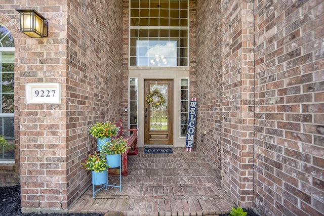 9227 Forest Creek Dr, Tomball, TX 77375 - doorway to property with brick siding