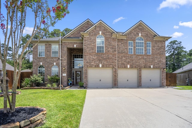 9227 Forest Creek Dr, Tomball, TX 77375 - view of front of home featuring driveway, a garage, and brick siding