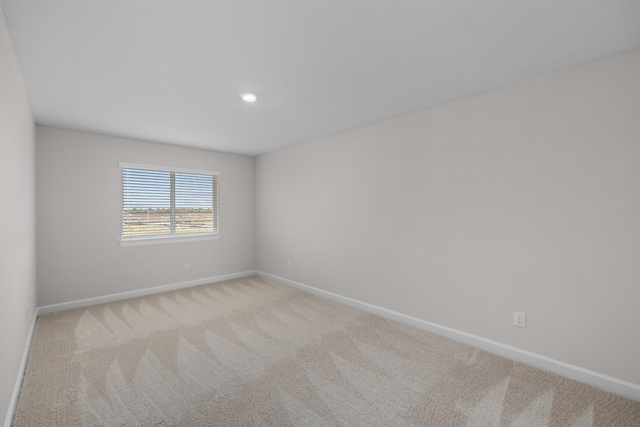 3122 Banyan Dr, Texas City, TX 77510 - empty room featuring light colored carpet and recessed lighting