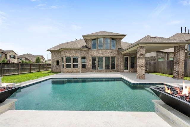 27902 Middlewater View Ln, Katy, TX 77494 - view of pool featuring a fire pit, a fenced backyard, and a patio