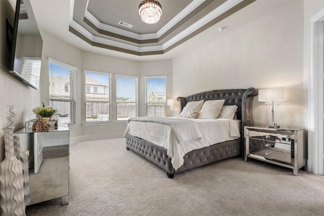 27902 Middlewater View Ln, Katy, TX 77494 - carpeted bedroom featuring ornamental molding, a chandelier, and a tray ceiling
