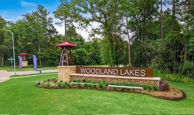 526 Emerald Thicket Ln, Huffman, TX 77336 - community / neighborhood sign featuring a yard