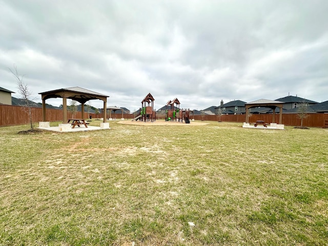 526 Emerald Thicket Ln, Huffman, TX 77336 - fenced backyard featuring a gazebo and a patio