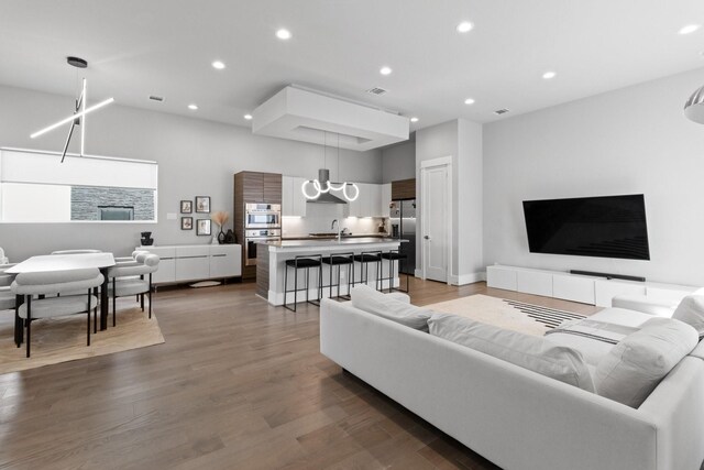 1617 Wheeler St Unit C, Houston, TX 77004 - living room featuring recessed lighting and wood finished floors