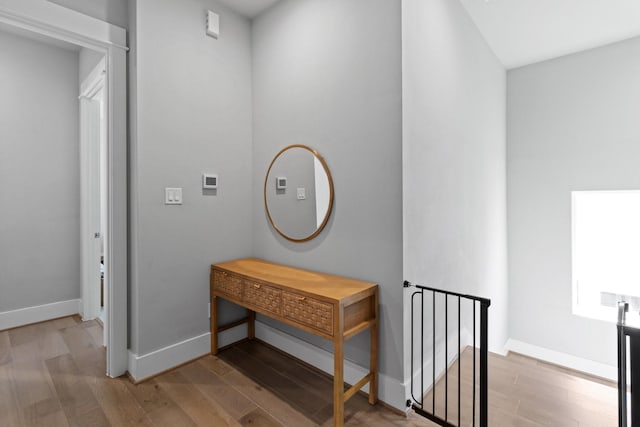 1617 Wheeler St Unit C, Houston, TX 77004 - corridor with wood finished floors and an upstairs landing