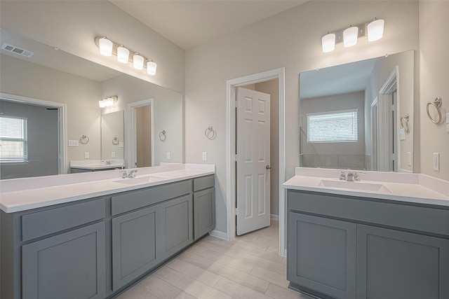 1452 Sundown Glen Ln, Katy, TX 77493 - full bathroom featuring two vanities