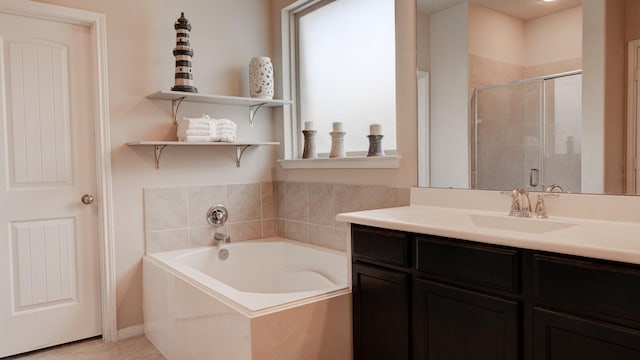 4407 Crosley Field Dr, Spring, TX 77389 - bathroom with vanity, a bath, and a stall shower