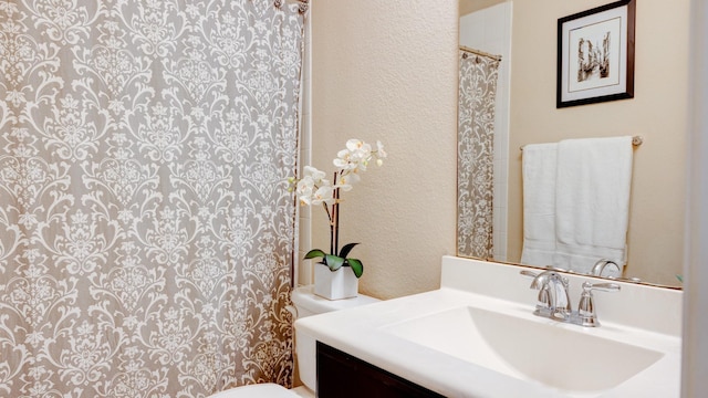 4407 Crosley Field Dr, Spring, TX 77389 - full bath featuring vanity, a textured wall, and curtained shower
