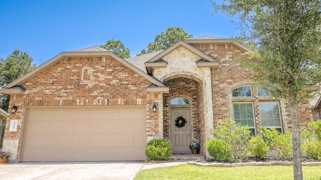 4407 Crosley Field Dr, Spring, TX 77389 - french provincial home with brick siding, a garage, and driveway