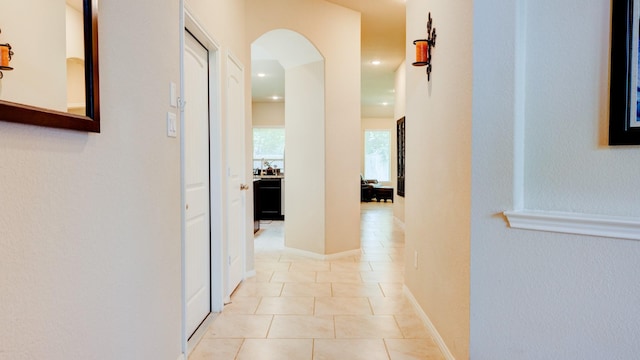 4407 Crosley Field Dr, Spring, TX 77389 - corridor with arched walkways, light tile patterned floors, and recessed lighting