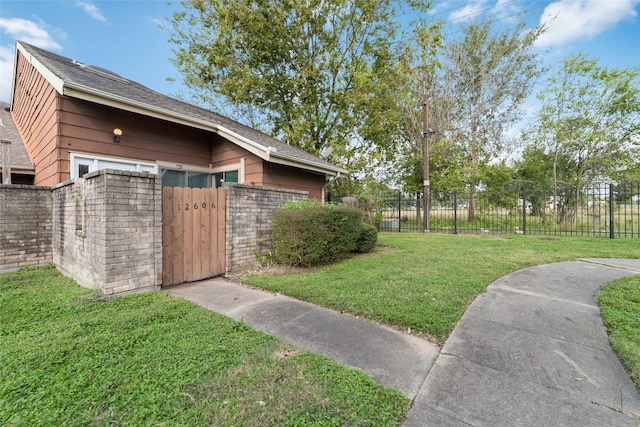 12606 Wellington Park Dr, Houston, TX 77072 - fenced front yard featuring a gate