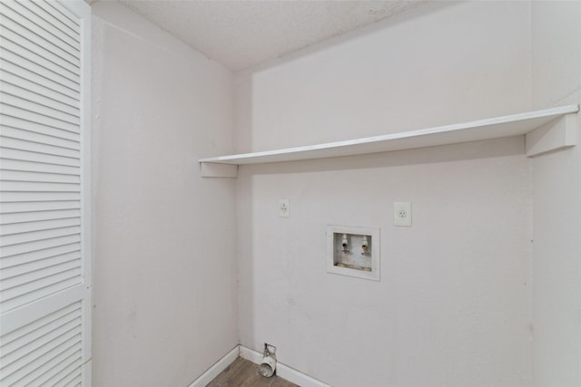 12606 Wellington Park Dr, Houston, TX 77072 - laundry room featuring hookup for a washing machine, electric dryer hookup, and wood finished floors
