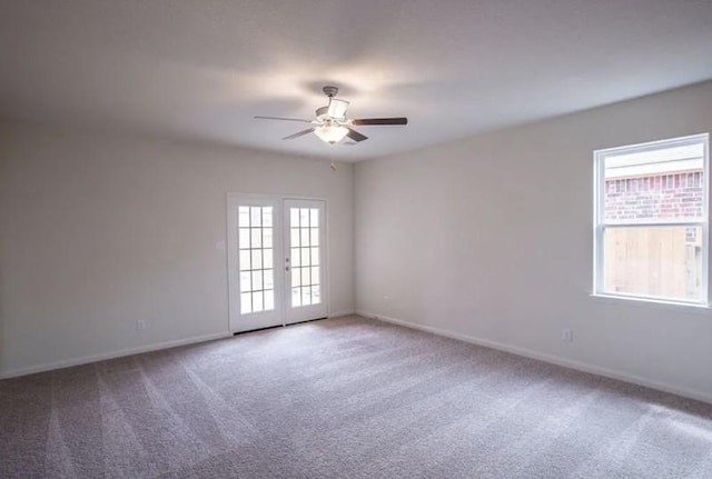 15302 Albert Oak Dr, Humble, TX 77396 - carpeted spare room featuring ceiling fan and french doors