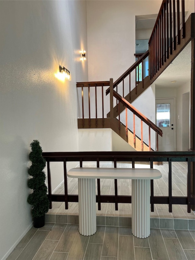 12922 Wirevine Ln, Houston, TX 77072 - stairway featuring baseboards