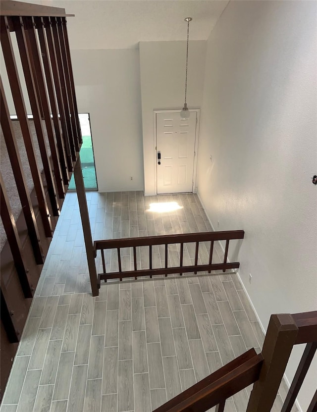 12922 Wirevine Ln, Houston, TX 77072 - stairs featuring wood tiled floors and baseboards