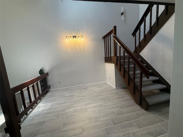 12922 Wirevine Ln, Houston, TX 77072 - stairway featuring wood tiled floors and baseboards