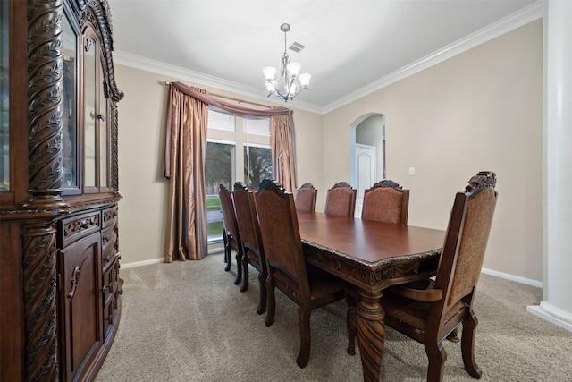 4314 Walden Terrace Ln, Humble, TX 77396 - dining room featuring arched walkways, light colored carpet, crown molding, and a chandelier
