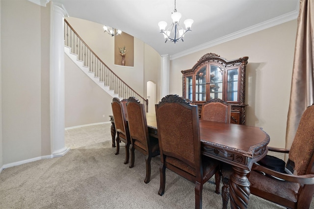 4314 Walden Terrace Ln, Humble, TX 77396 - dining room featuring a chandelier, stairs, light colored carpet, crown molding, and arched walkways