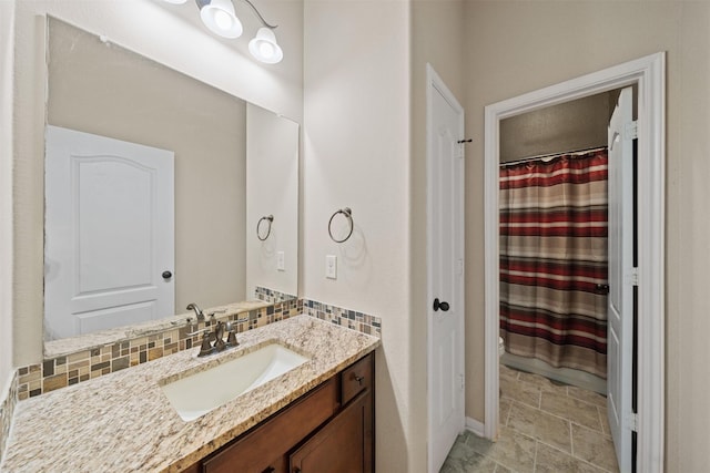 4314 Walden Terrace Ln, Humble, TX 77396 - bathroom featuring vanity, decorative backsplash, and a shower with shower curtain