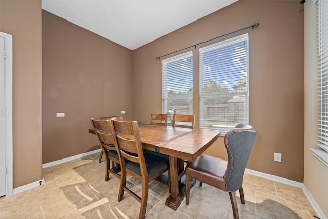 4314 Walden Terrace Ln, Humble, TX 77396 - dining room featuring baseboards and light tile patterned flooring