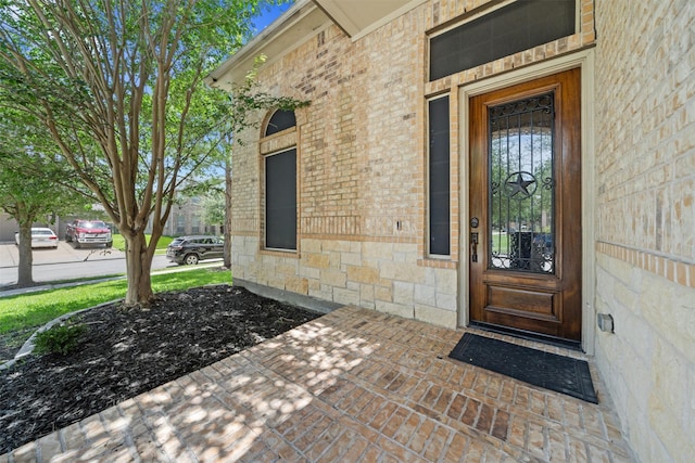4314 Walden Terrace Ln, Humble, TX 77396 - doorway to property featuring stone siding