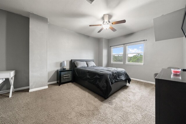 4314 Walden Terrace Ln, Humble, TX 77396 - carpeted bedroom featuring baseboards and a ceiling fan