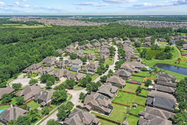 4314 Walden Terrace Ln, Humble, TX 77396 - aerial perspective of suburban area featuring a heavily wooded area and a large body of water