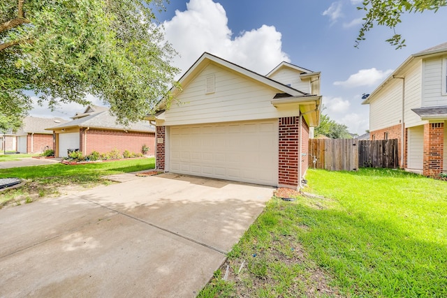 12511 Garden Gale Ln, Houston, TX 77044 - traditional-style house featuring brick siding, concrete driveway, and an attached garage