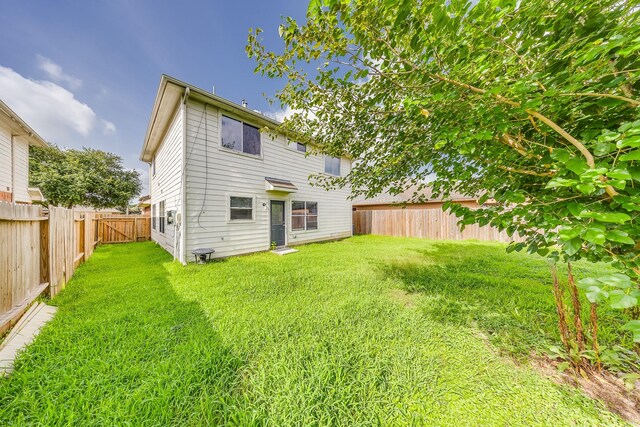 12511 Garden Gale Ln, Houston, TX 77044 - rear view of house featuring a fenced backyard