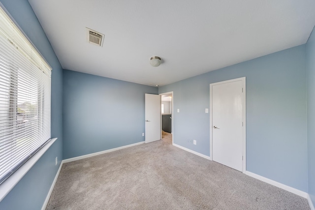12511 Garden Gale Ln, Houston, TX 77044 - unfurnished bedroom featuring carpet flooring and baseboards
