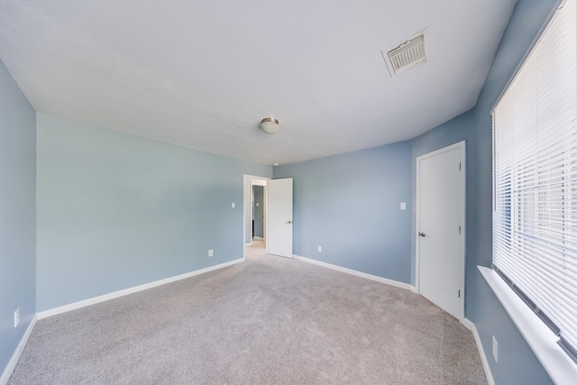 12511 Garden Gale Ln, Houston, TX 77044 - carpeted spare room featuring baseboards