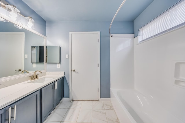 12511 Garden Gale Ln, Houston, TX 77044 - full bathroom featuring vanity, marble finish flooring, and tub / shower combination
