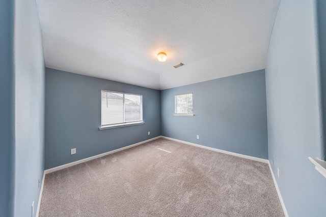 12511 Garden Gale Ln, Houston, TX 77044 - unfurnished room with carpet flooring and a textured ceiling