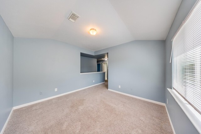 12511 Garden Gale Ln, Houston, TX 77044 - carpeted spare room featuring vaulted ceiling