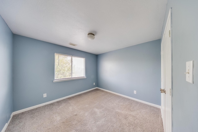 12511 Garden Gale Ln, Houston, TX 77044 - spare room featuring carpet floors and baseboards