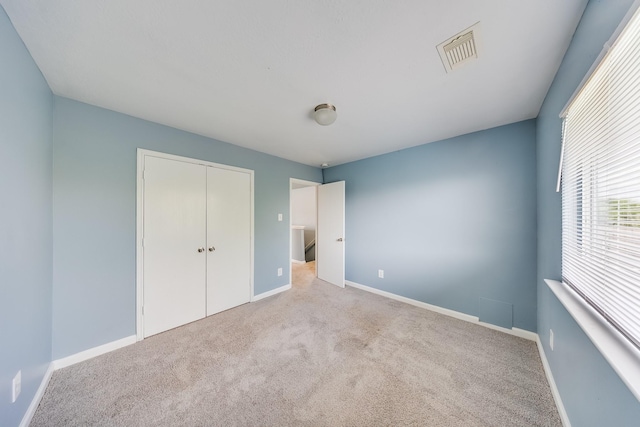 12511 Garden Gale Ln, Houston, TX 77044 - unfurnished bedroom with carpet and a closet