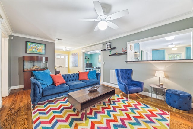 308 W 33rd St, Houston, TX 77018 - living room featuring ornamental molding, wood finished floors, and ceiling fan