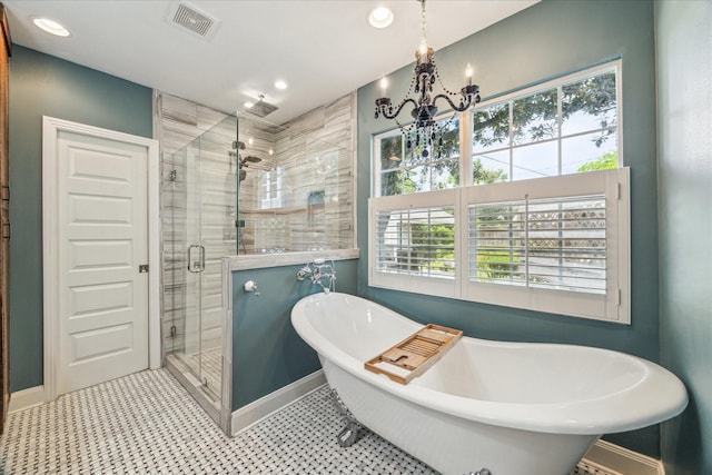 308 W 33rd St, Houston, TX 77018 - bathroom with a stall shower, a chandelier, a soaking tub, and recessed lighting