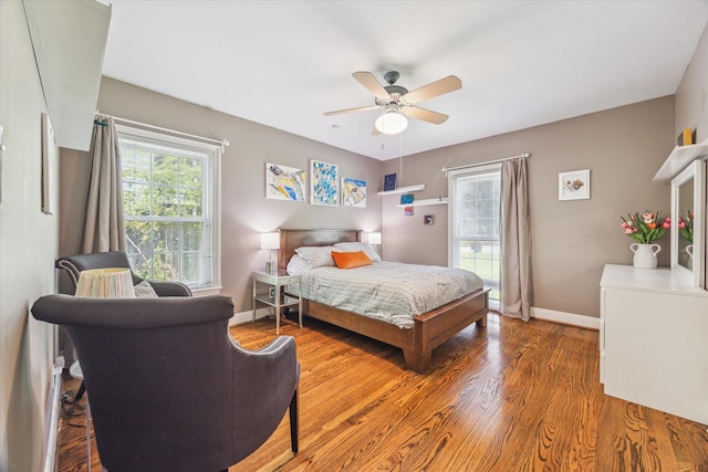 308 W 33rd St, Houston, TX 77018 - bedroom featuring wood finished floors and ceiling fan